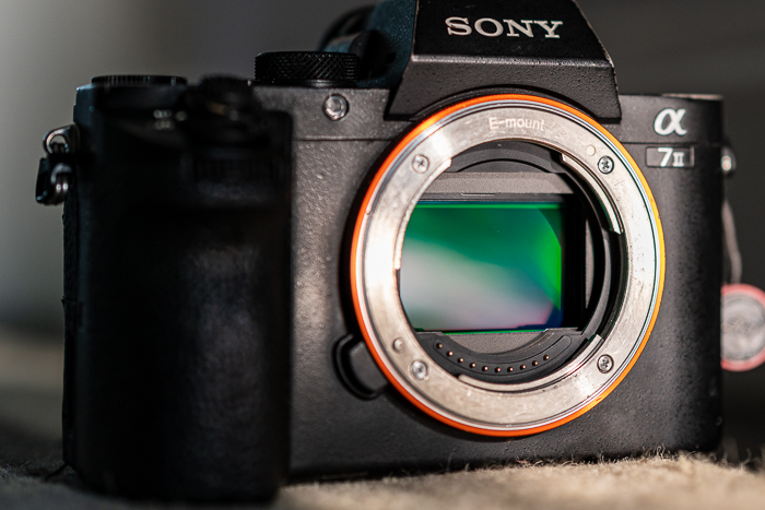A Sony mirrorless camera up close with its sensor exposed