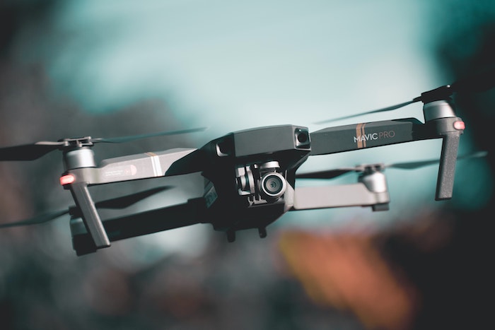A Mavic Pro DJI camera brand drone in flight