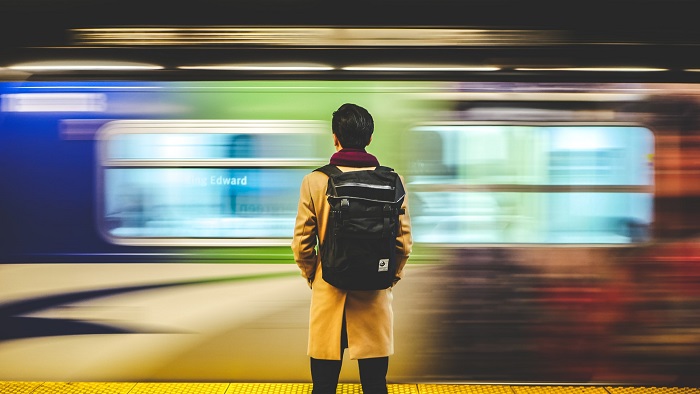 a slow shutter speed creates an intentionally blurry image of the subway