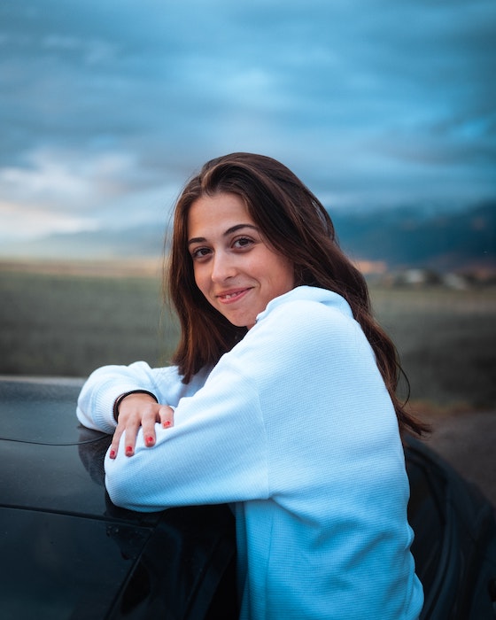 Portrait of a woman outside taken with a Fujifilm X-T4